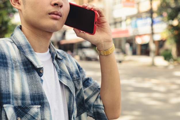 Asian man waiting for taxi