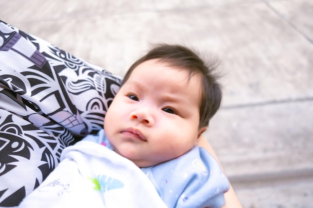 Asian mom carry infant or baby child babe child childhood so cute