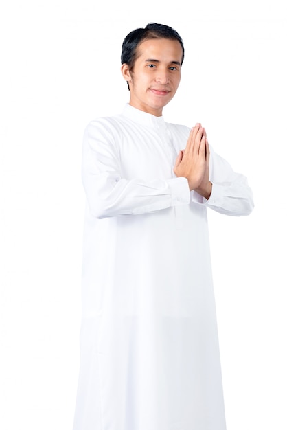 Asian Muslim man standing and praying