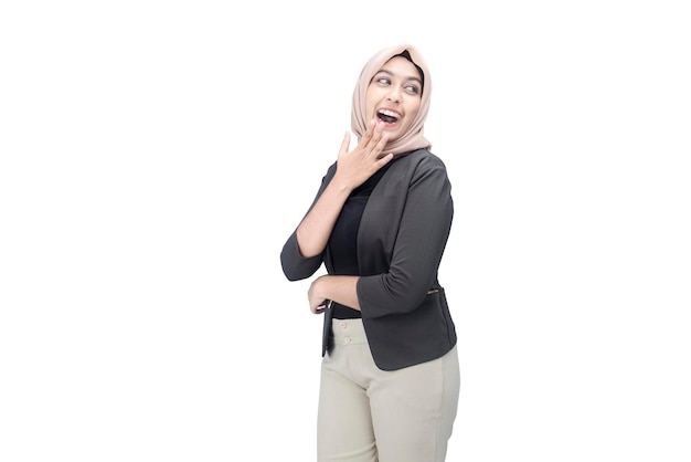 Asian Muslim woman in headscarf laughing isolated over white background