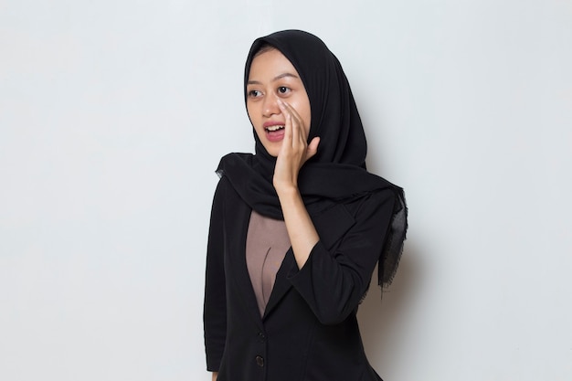 Asian muslim woman wearing hijab announcement