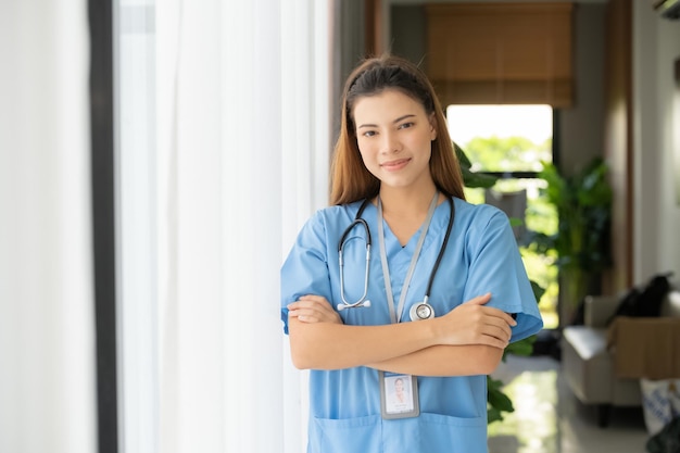 Asian nurse standing in hospital