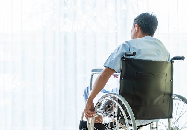 Asian patient wheelchair in empty room