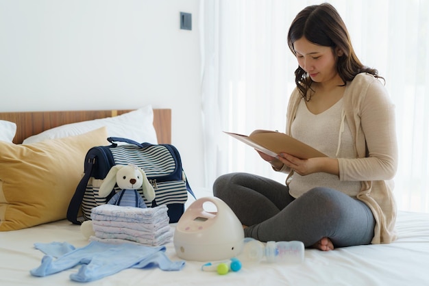 Asian Pregnant woman prenatal calendar planner and baby monitor utensils container