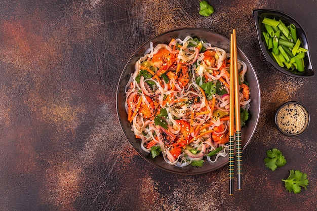 Asian salad with rice noodles, shrimp and vegetables