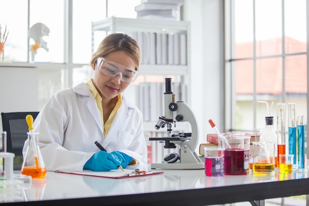 Asian scientist working in laboratory scientist