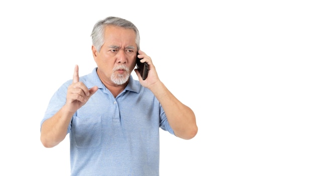 Asian senior man old man was standing and talking on the phone with a serious expression on his face seemed that there was something serious that made him very worried and uneasy isolated on white