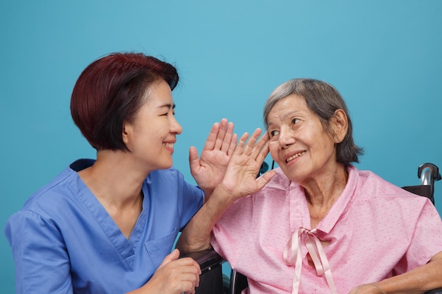 Asian seniors woman hearing loss Hard of hearing