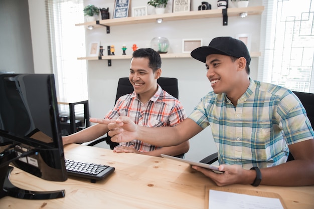 Asian small office with two employee working