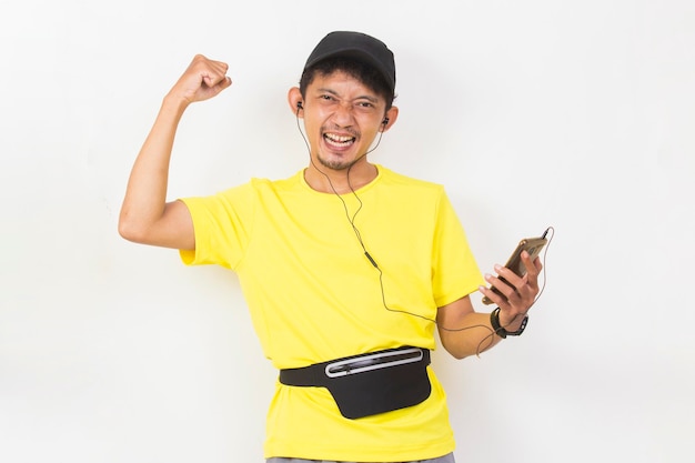 asian sporty man using mobile phone isolated on white background