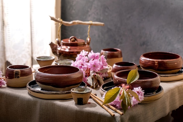 Asian style table setting with craft tableware