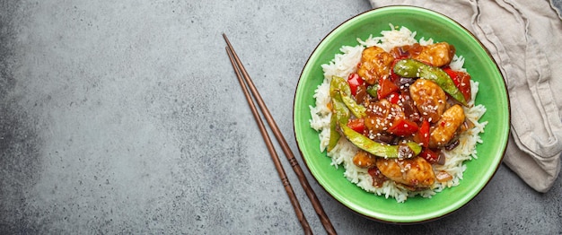 Asian sweet and sour sticky chicken with vegetables stirfry