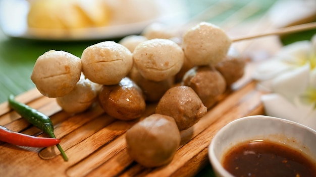 Asian Thai grilled meatballs and pork balls on skewer