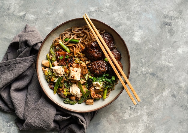 asian vegan soba noodle  with tofu cheese,shiitake mushroms, top view,   