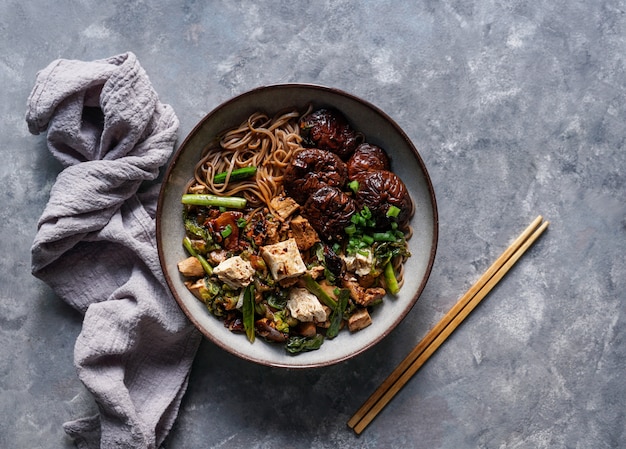 Asian vegan soba noodle  with tofu cheese, shiitake mushrooms