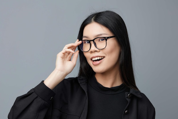 Asian woman beautiful fashion background studio portrait smile glasses