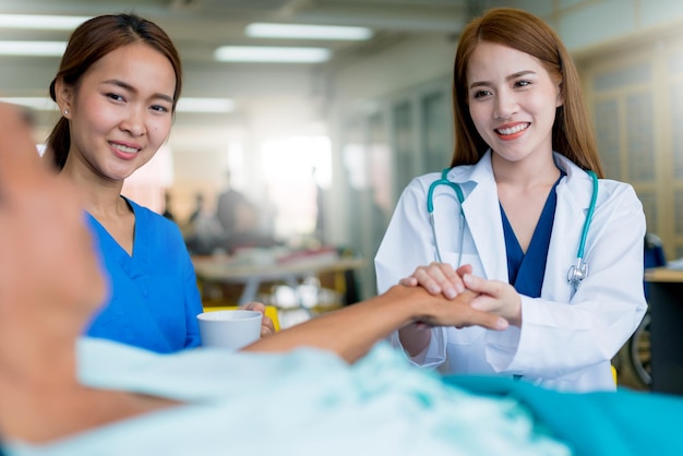 Asian woman doctor encouragement and supportive to cansor patient after consult and examine in clinic hospital health ideas concept