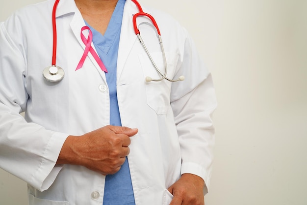 Asian woman doctor with pink ribbon World Breast Cancer Day at October