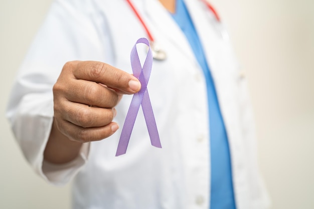 Asian woman doctor with purple ribbon sign of Alzheimer disease day Pancreatic cancer Epilepsy Lupus