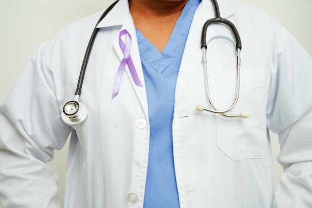 Asian woman doctor with purple ribbon World Pancreatic Cancer day or World Alzheimer day