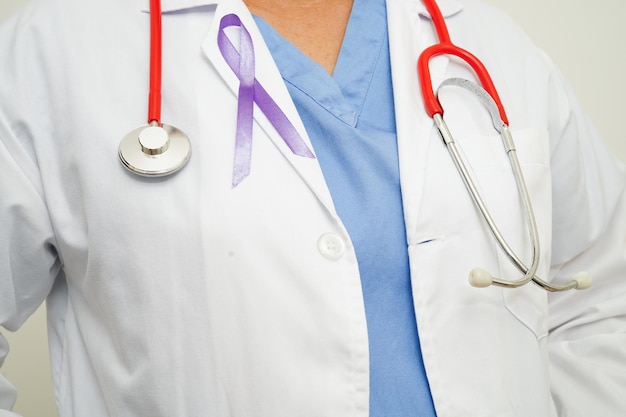 Asian woman doctor with purple ribbon World Pancreatic Cancer day or World Alzheimer day