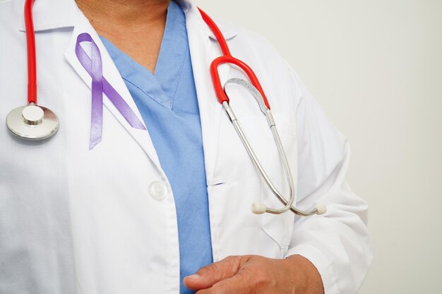 Asian woman doctor with purple ribbon World Pancreatic Cancer day or World Alzheimer day