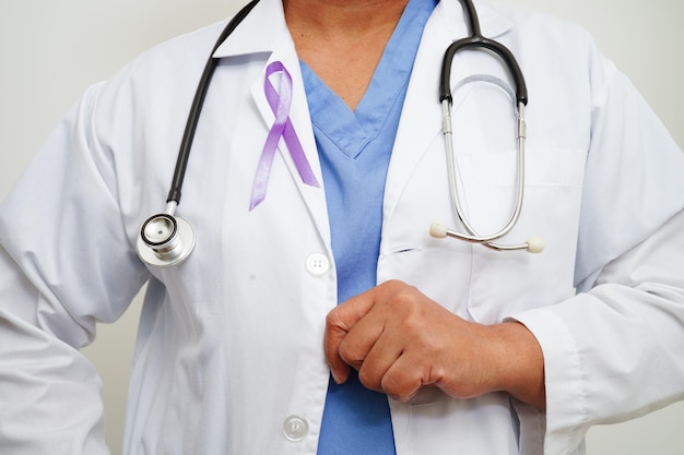 Asian woman doctor with purple ribbon World Pancreatic Cancer day or World Alzheimer day