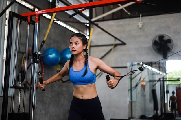 Asian woman in fitness gym