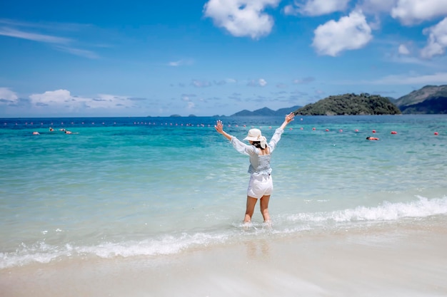 Asian woman Happy strolling on the sandy beach Koh Lipe Thailand