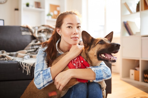 Asian Woman Posing with Dog