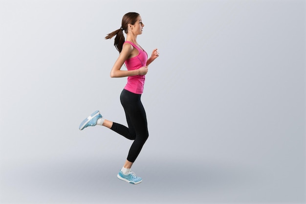 Asian woman run marathon studio white background.