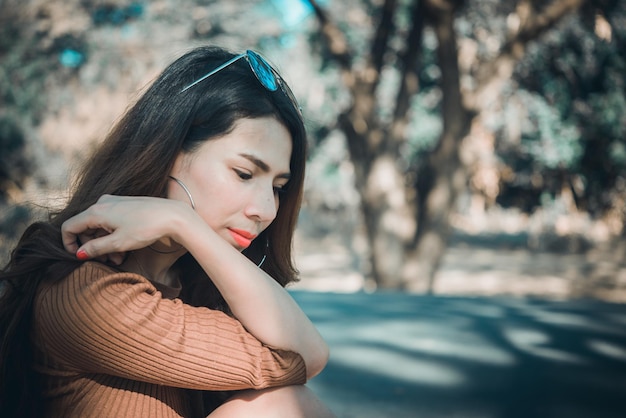 Asian woman sad from loveShe worry because stress from boyfriendHeartbreak woman conceptThailand people