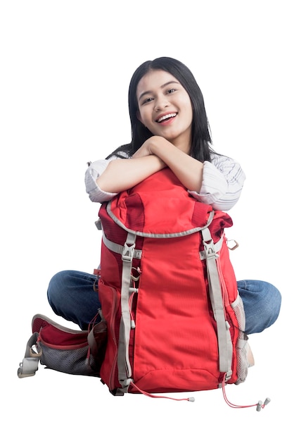 Asian woman sitting with her a backpack