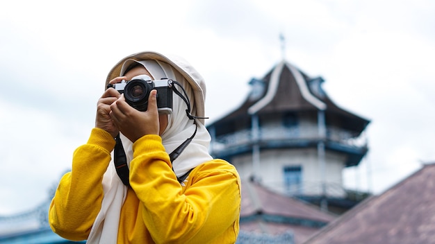 An Asian woman traveler in keraton solo