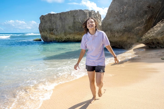 Asian woman traveling on the beach