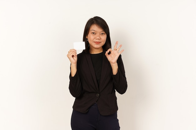 Asian Woman Wearing black suit Holding and showing blank credit card Isolated on white background