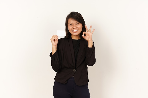 Asian Woman Wearing black suit Holding and showing blank credit card Isolated on white background