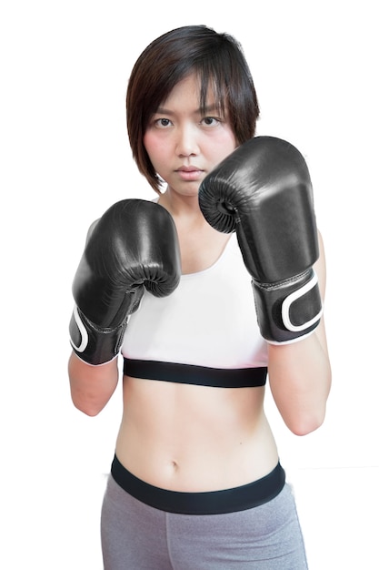 asian woman wearing boxing gloves posing in boxing combat stance