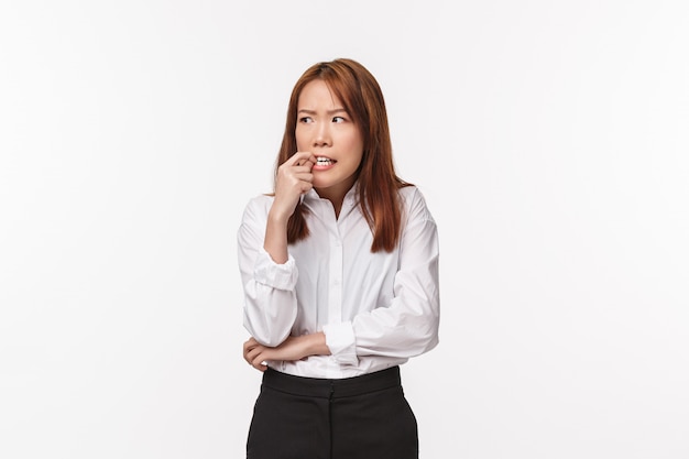 Asian woman in white shirt on white