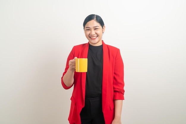 Asian woman with hand holding coffee cup on white background