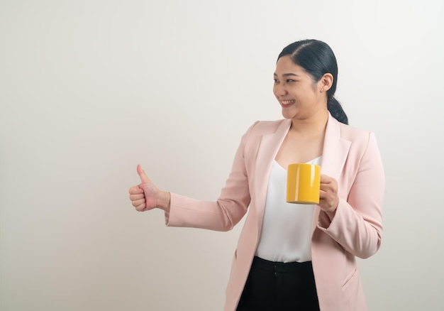 Asian woman with hand holding coffee cup