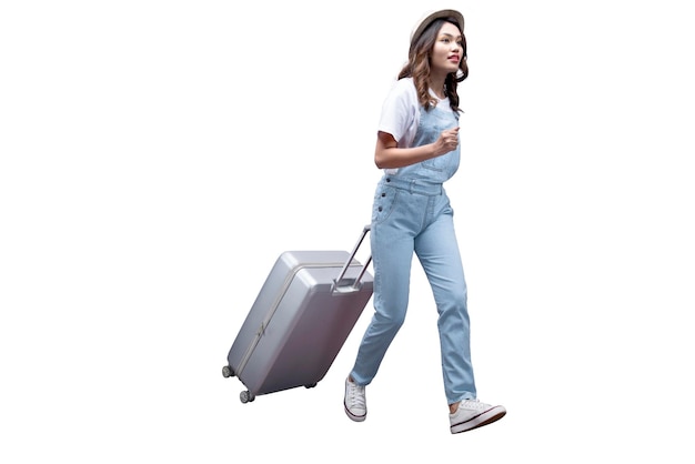 Asian woman with a hat and carrying suitcase