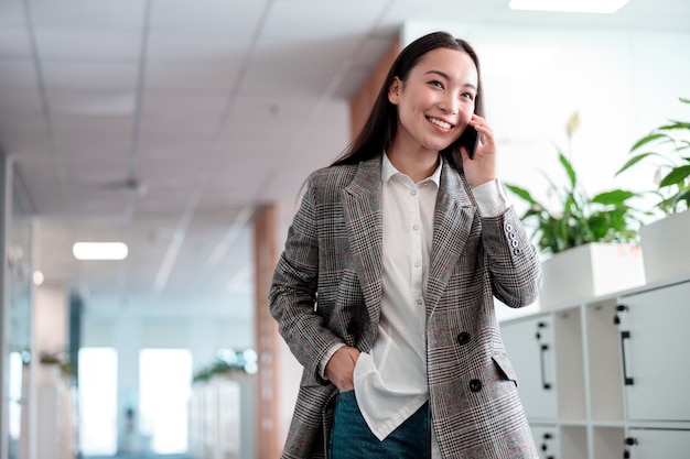 Asian woman working in IT office