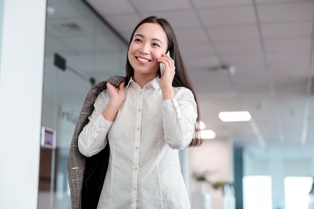 Asian woman working in IT office