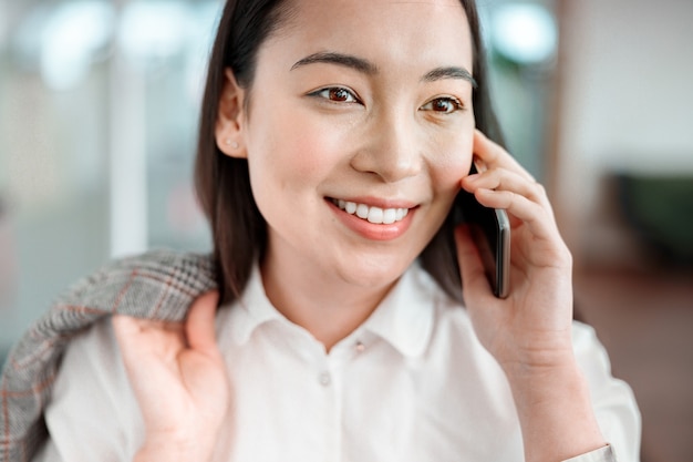 Asian woman working in IT office