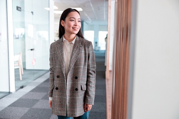 Asian woman working in IT office