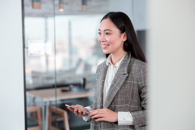 Asian woman working in IT office