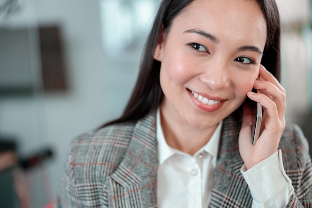 Asian woman working in IT office