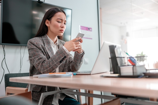 Asian woman working in IT office