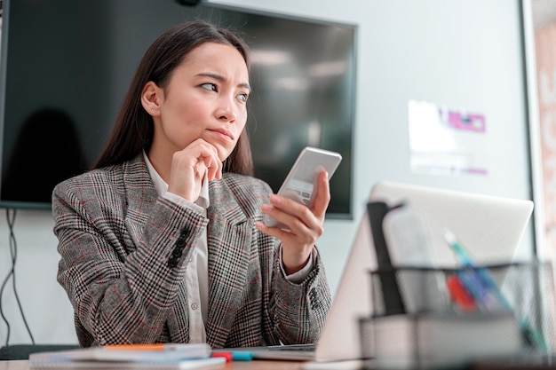 Asian woman working in IT office